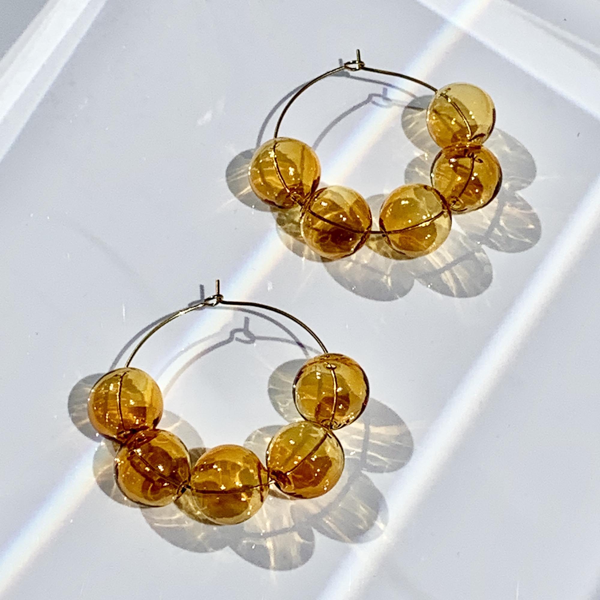 Charged Glassworks Handcrafted Jewelry, Home Décor, and Luxury Designs